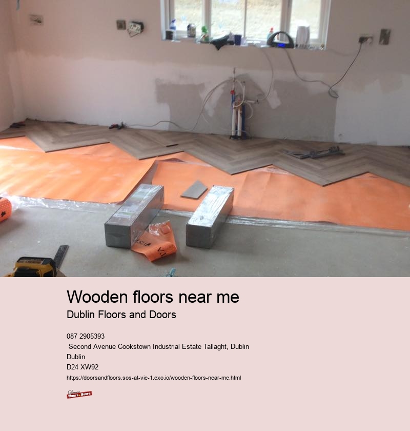 In what room should you avoid using wood floors?